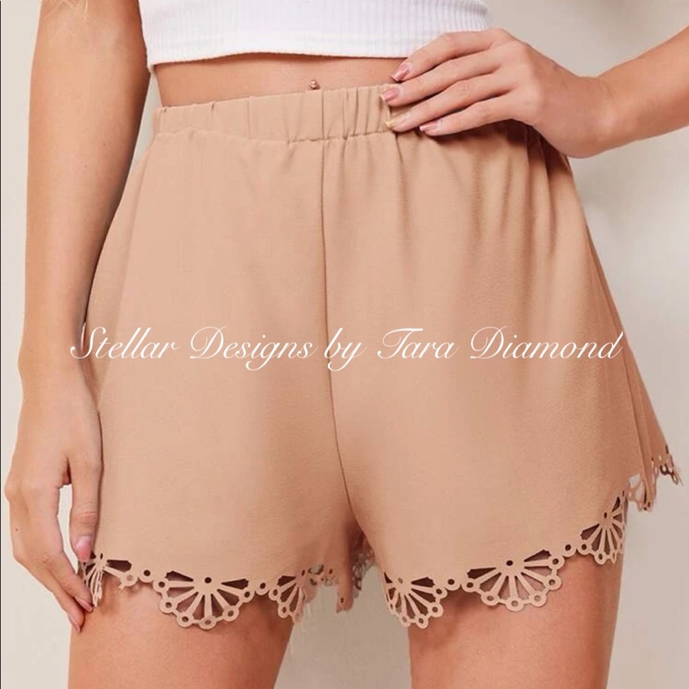 76. Laser cut flowy shorts